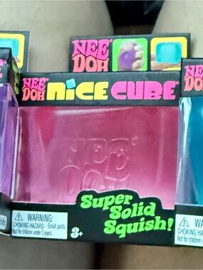 Authentic Schylling NeeDoh Nice Cube brand new in original packaging!